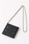 FOUR STITCHES CLUTCH IN BLACK, SS24